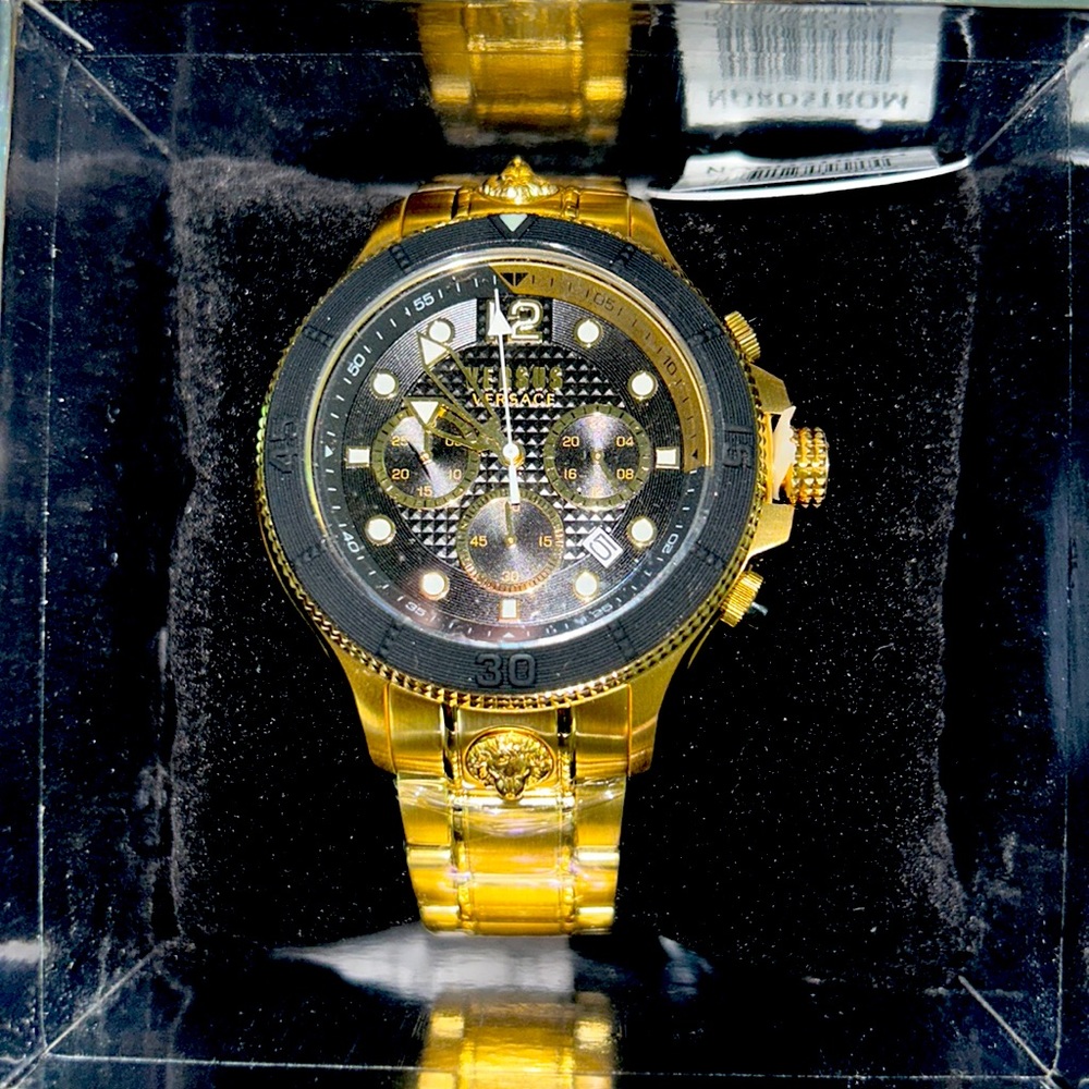Black and Gold Versus by Versace Men’s Watch.